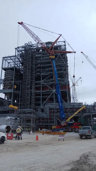 Liebherr LTM1800 mobile crane lifting a boiler component