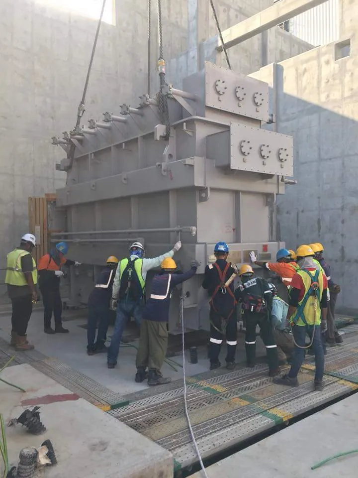 Rigging crew preparing a 500 tonne transformer for lifting